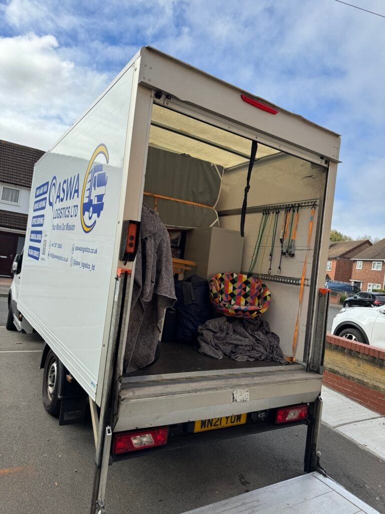 QASWA Logistics LTD removal van ready for moving house in East London