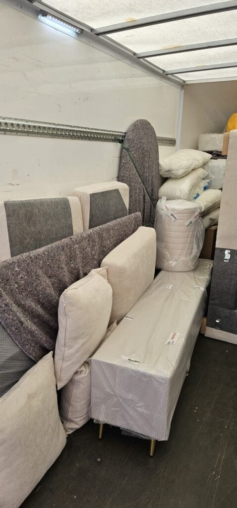 Qaswa Logistics man and van London service with protected furniture inside a Luton van